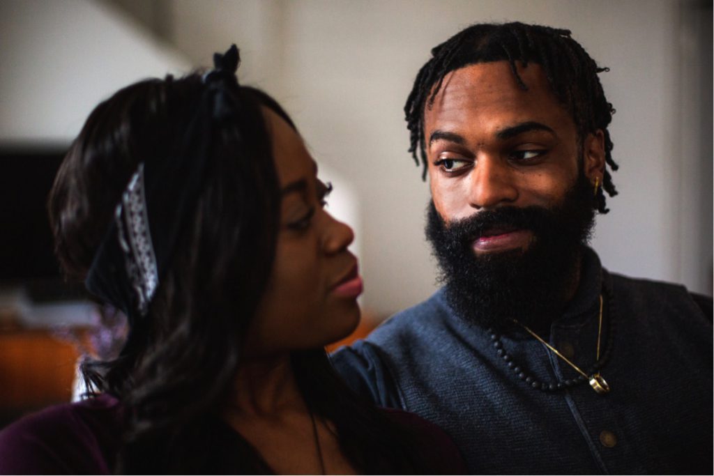 A man and a woman gaze into each others eyes