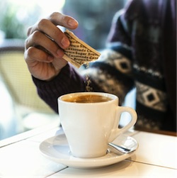 Sugar and coffee in a cup