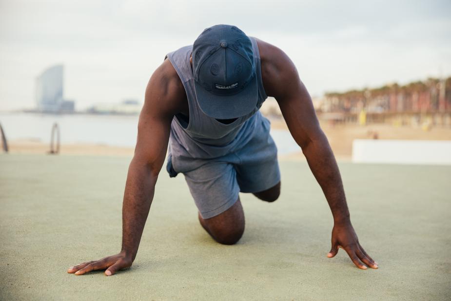 Man stretches before exercise