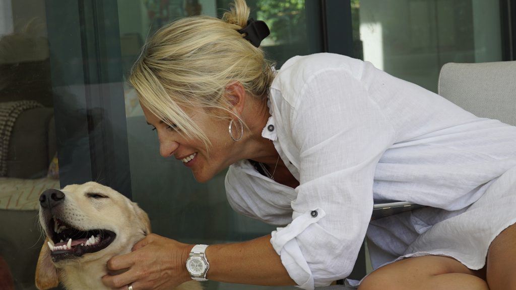 Nutritional Therapist Emma Tellett with her dog